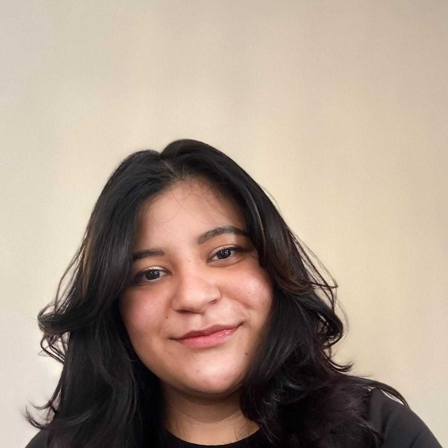 Portrait of Dayle, a professional stylist at [salon] 718, showcasing their expertise and style.