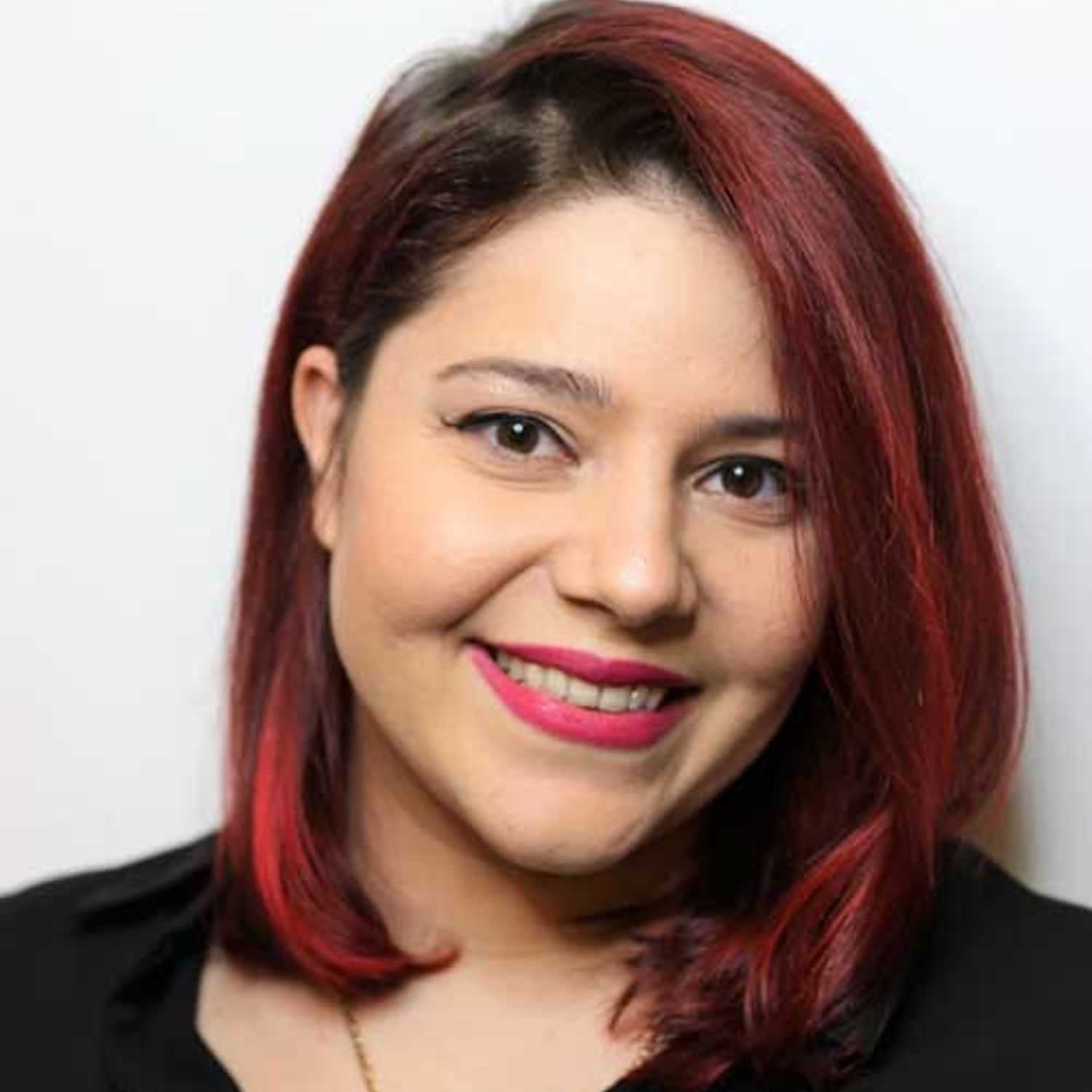 Portrait of Alyssa, a professional stylist at [salon] 718, showcasing their expertise and style.