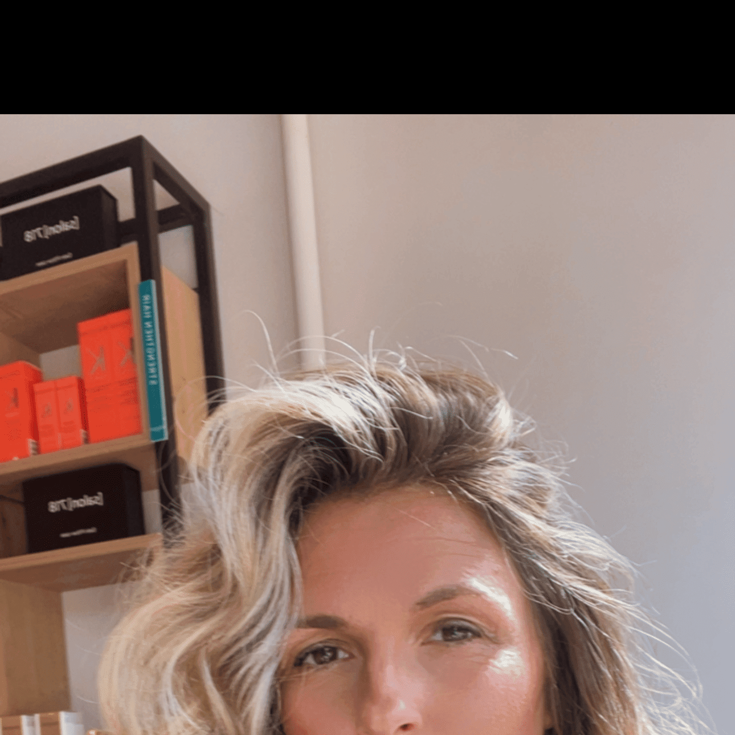 Portrait of Stephanie, a professional stylist at [salon] 718, showcasing their expertise and style.