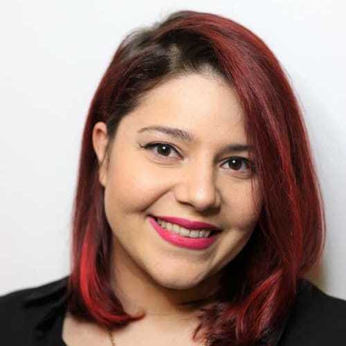 Portrait of Alyssa, a professional stylist at [salon] 718, showcasing their expertise and style.