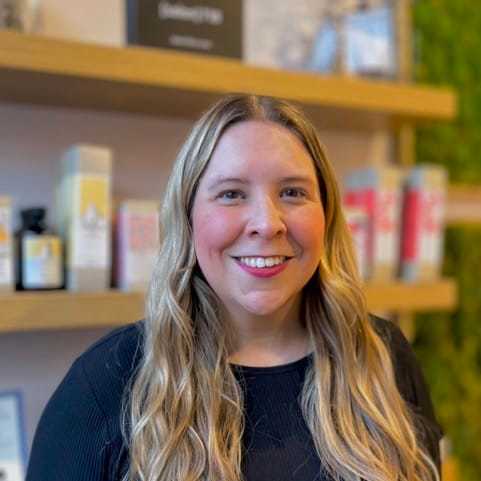 Portrait of Karen H, a professional stylist at [salon] 718, showcasing their expertise and style.