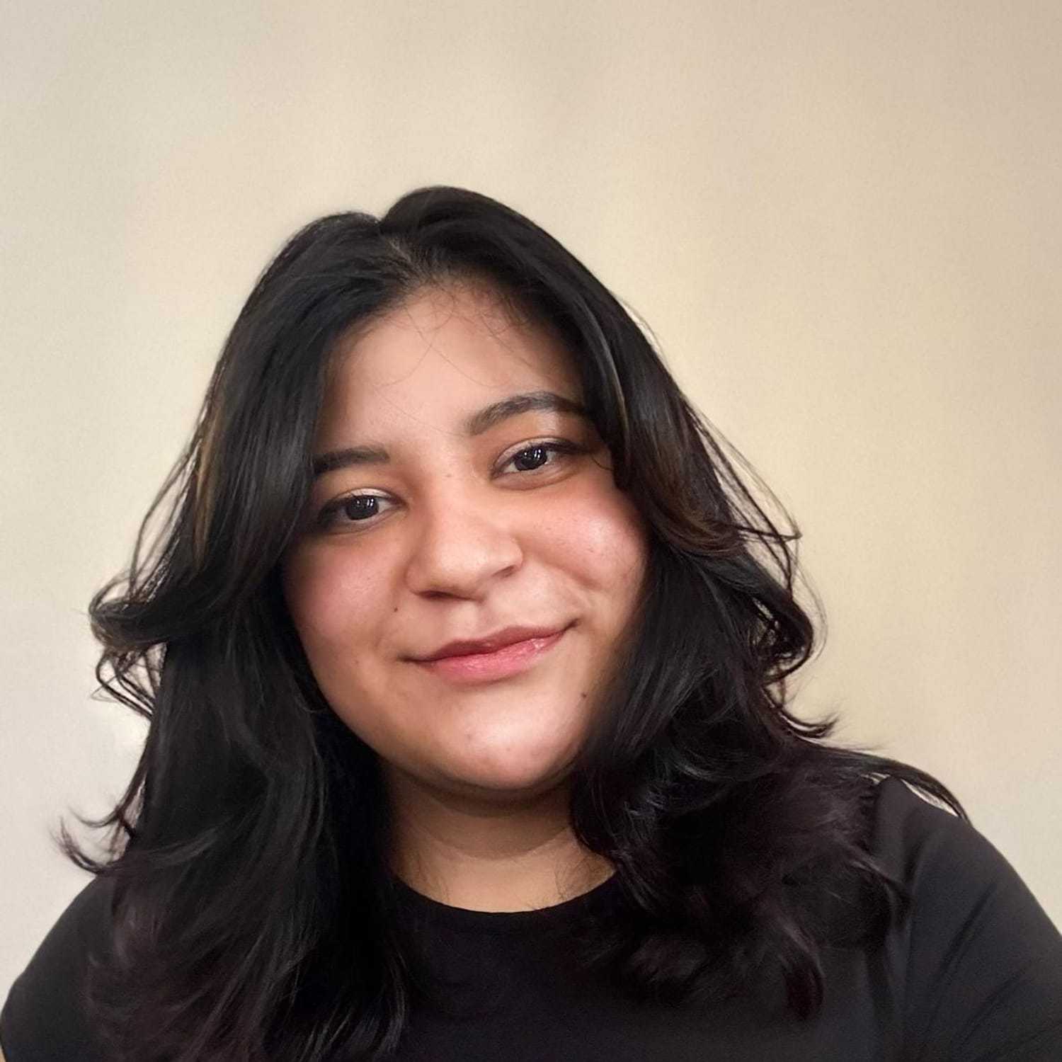 Portrait of Dayle, a professional stylist at [salon] 718, showcasing their expertise and style.