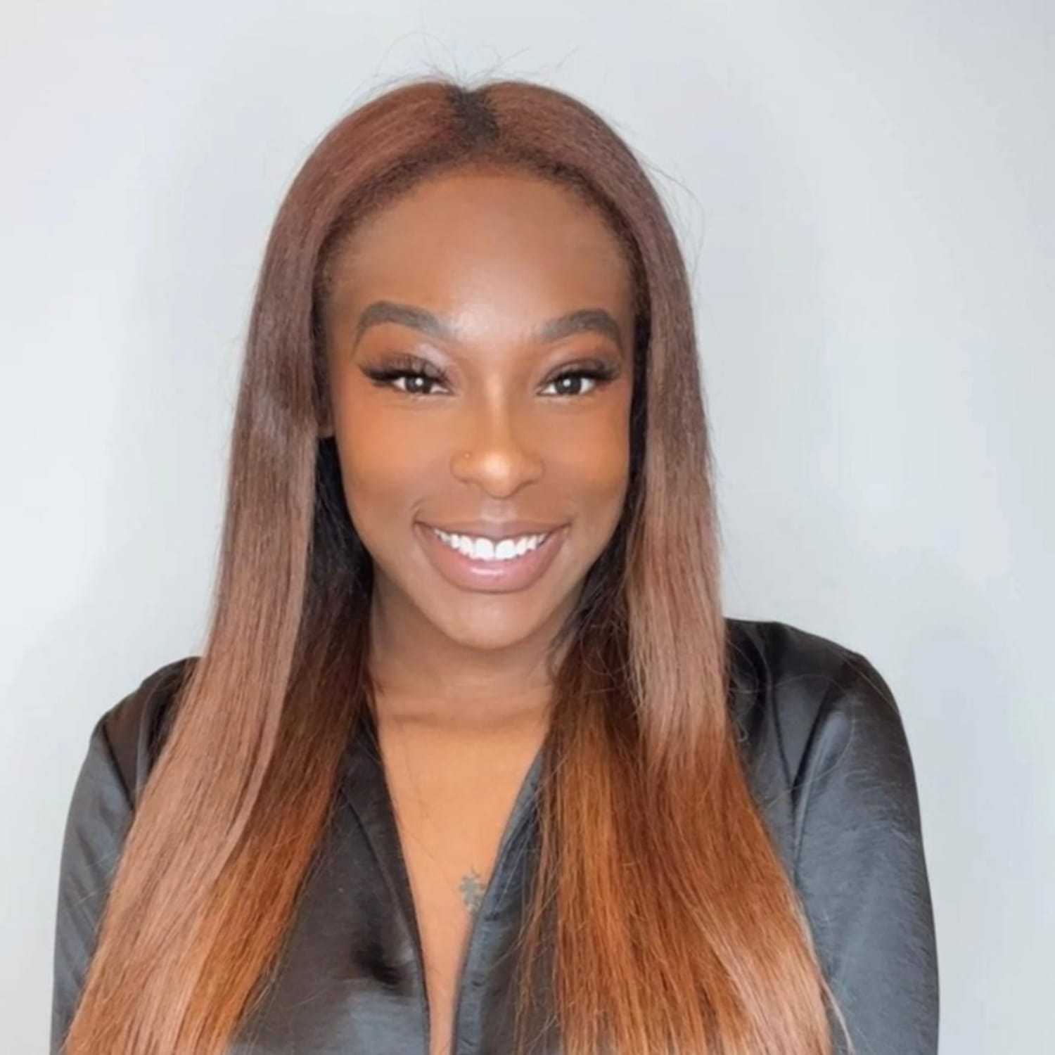 Portrait of Ari, a professional stylist at [salon] 718, showcasing their expertise and style.