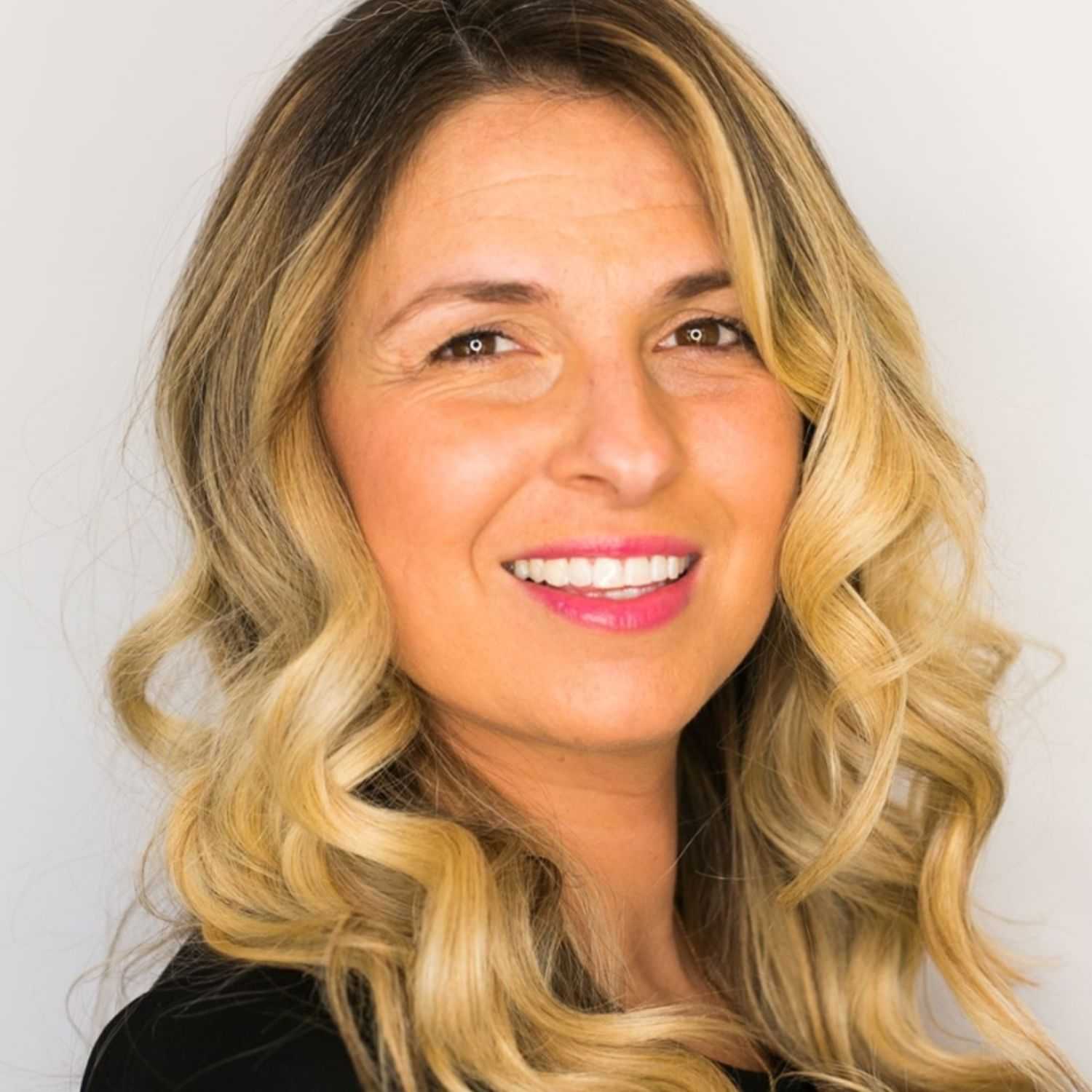 Portrait of Stephanie, a professional stylist at [salon] 718, showcasing their expertise and style.