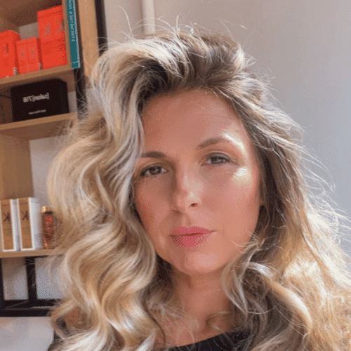 Portrait of Stephanie, a professional stylist at [salon] 718, showcasing their expertise and style.